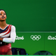 Gabby Douglas waits on the monitor to display the score during women’s gymnastics competition at the Olympic Games on Aug. 9, 2016, in Rio de Janeiro.
Laurence Griffiths/Getty Images